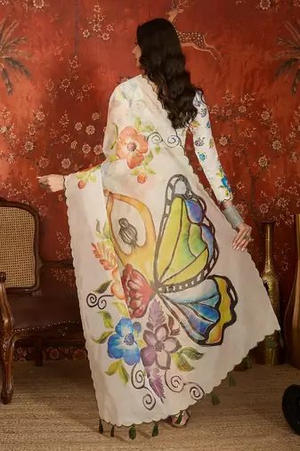 Off white organza printed saree with unstitched blouse piece.