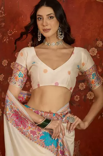cream pashmina silk blend woven saree with unstitched blouse piece.