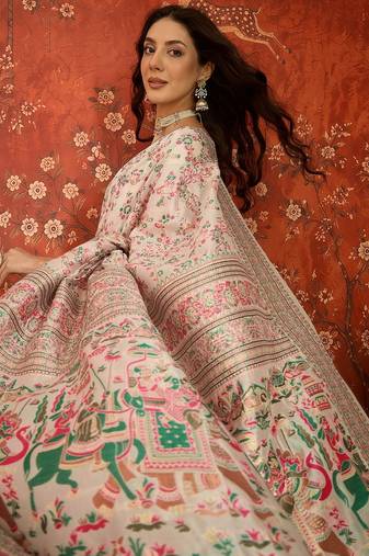 Cream pashmina silk woven saree with unstitched blouse piece.