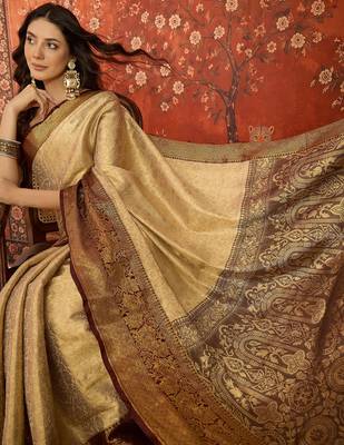 cream kanjeevaram silk blend woven design saree with unstitched blouse piece. 2