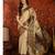 cream kanjeevaram silk blend woven design saree with unstitched blouse piece.