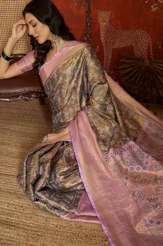 olive kanjeevaram silk blend woven design saree with unstitched blouse piece.