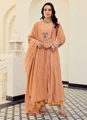 Women's peach chanderi embroidered flared kurta set with dupatta and pant 1