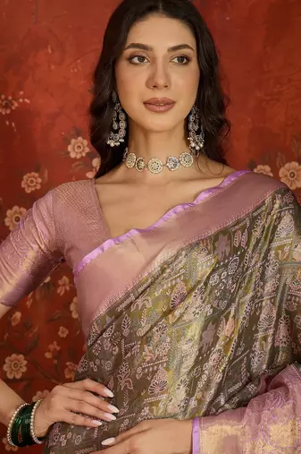 olive kanjeevaram silk blend woven design saree with unstitched blouse piece.