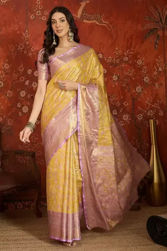 yellow kanjeevaram silk blend woven design saree with unstitched blouse piece.