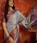 sky blue kanjeevaram silk blend woven design saree with unstitched blouse piece.