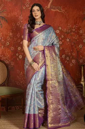 sky blue kanjeevaram silk blend woven design saree with unstitched blouse piece.