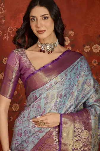 sky blue kanjeevaram silk blend woven design saree with unstitched blouse piece.