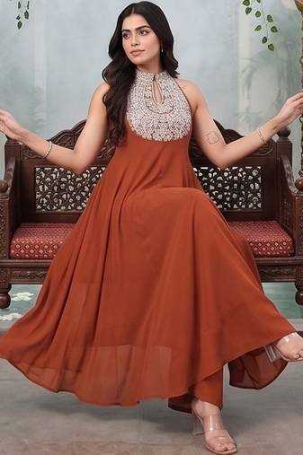 Women Ethnic Motifs Embroidered Regular Thread Work Silk Georgette Kurta with Trousers