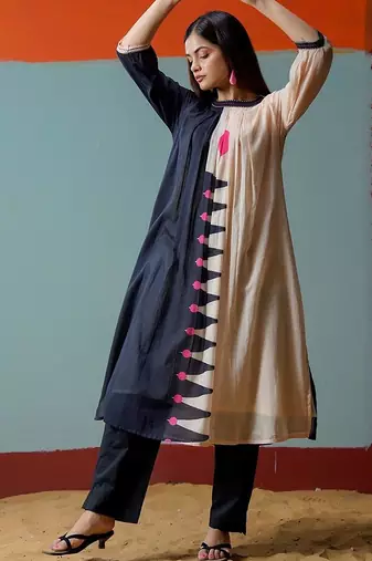 Women Printed Panelled Kurta with Trousers
