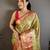 green kanjeevaram silk blend zari woven saree with unstitched blouse piece.