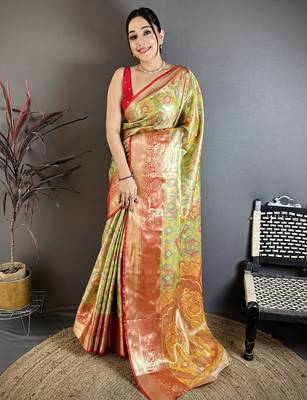 green kanjeevaram silk blend zari woven saree with unstitched blouse piece. 2