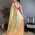 green kanjeevaram silk blend zari woven saree with unstitched blouse piece.