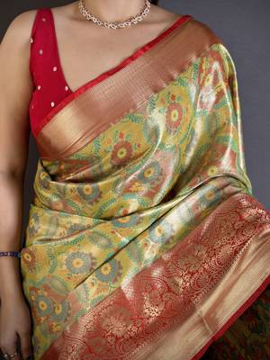 green kanjeevaram silk blend zari woven saree with unstitched blouse piece. 5