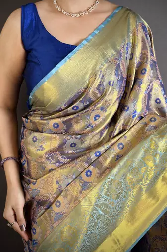 purple kanjeevaram silk blend zari woven saree with unstitched blouse piece.