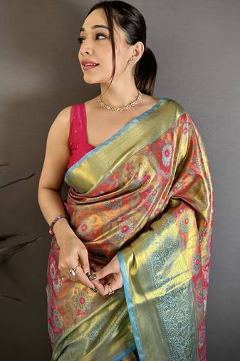 rani kanjeevaram silk blend zari woven saree with unstitched blouse piece.