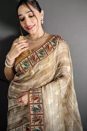 beige slub cotton blend printed saree with unstitched blouse piece.