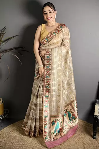 beige slub cotton blend printed saree with unstitched blouse piece.