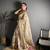 beige slub cotton blend printed saree with unstitched blouse piece.