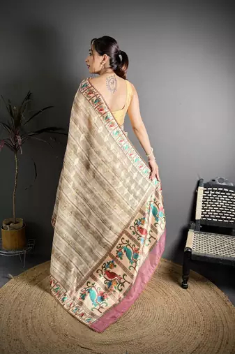 beige slub cotton blend printed saree with unstitched blouse piece.