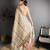 beige slub cotton blend printed saree with unstitched blouse piece.