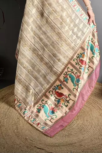beige slub cotton blend printed saree with unstitched blouse piece.