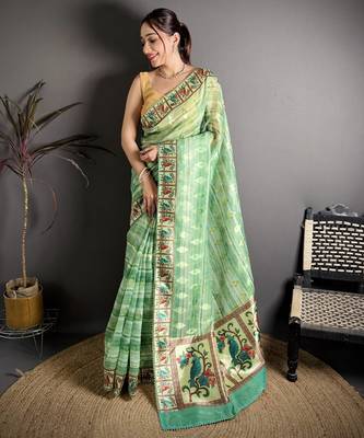 green slub cotton blend printed saree with unstitched blouse piece. 2