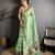 green slub cotton blend printed saree with unstitched blouse piece.