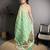 green slub cotton blend printed saree with unstitched blouse piece.