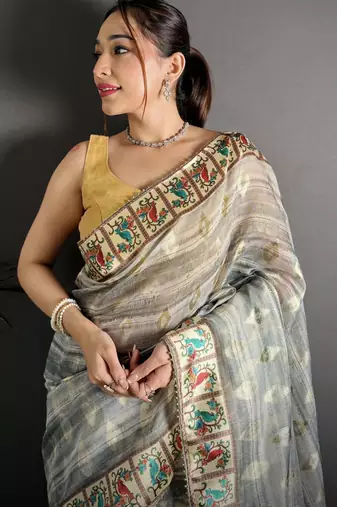 grey slub cotton blend printed saree with unstitched blouse piece.
