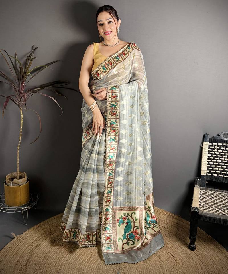 grey slub cotton blend printed saree with unstitched blouse piece.