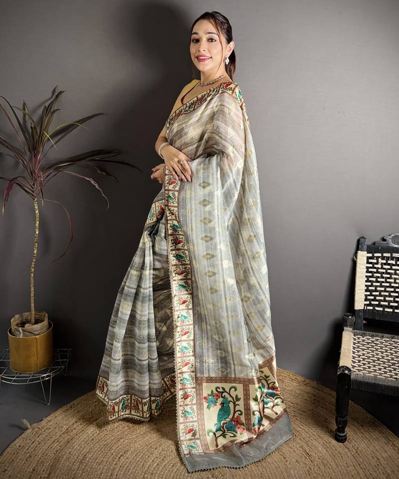 grey slub cotton blend printed saree with unstitched blouse piece.