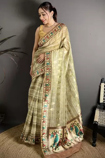 olive slub cotton blend printed saree with unstitched blouse piece.