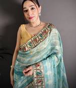 sky blue slub cotton blend printed saree with unstitched blouse piece.