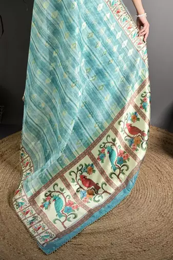 sky blue slub cotton blend printed saree with unstitched blouse piece.