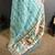 sky blue slub cotton blend printed saree with unstitched blouse piece.