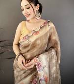 brown premium cotton blend printed saree with unstitched blouse piece.