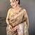 brown premium cotton blend printed saree with unstitched blouse piece.