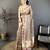 brown premium cotton blend printed saree with unstitched blouse piece.