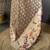 brown premium cotton blend printed saree with unstitched blouse piece.