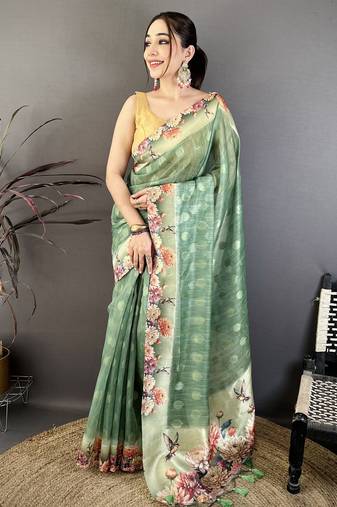 green premium cotton blend printed saree with unstitched blouse piece.