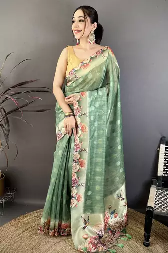 green premium cotton blend printed saree with unstitched blouse piece.