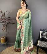 green premium cotton blend printed saree with unstitched blouse piece.
