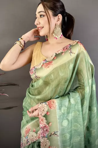 green premium cotton blend printed saree with unstitched blouse piece.