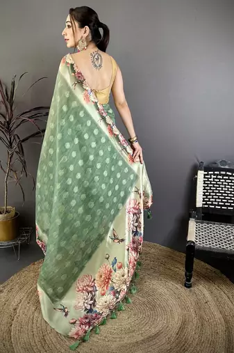 green premium cotton blend printed saree with unstitched blouse piece.