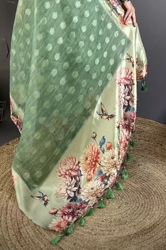 green premium cotton blend printed saree with unstitched blouse piece.