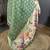 green premium cotton blend printed saree with unstitched blouse piece.
