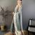 grey premium cotton blend printed saree with unstitched blouse piece.