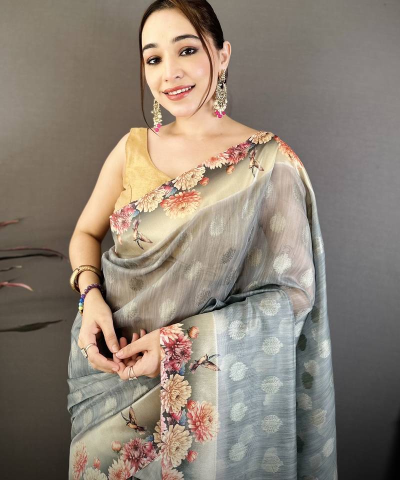 grey premium cotton blend printed saree with unstitched blouse piece.