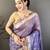 purple premium cotton blend printed saree with unstitched blouse piece.